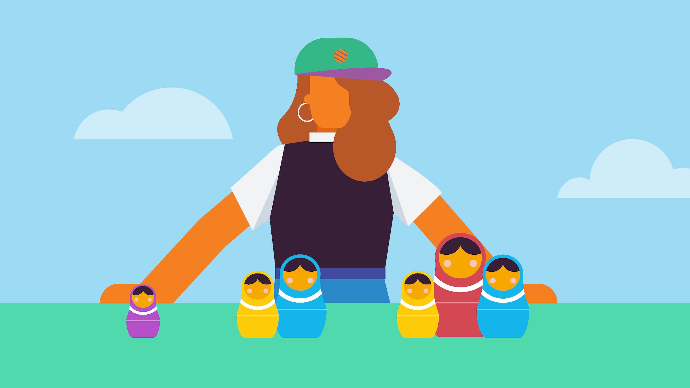 A person stands in front Russian dolls.