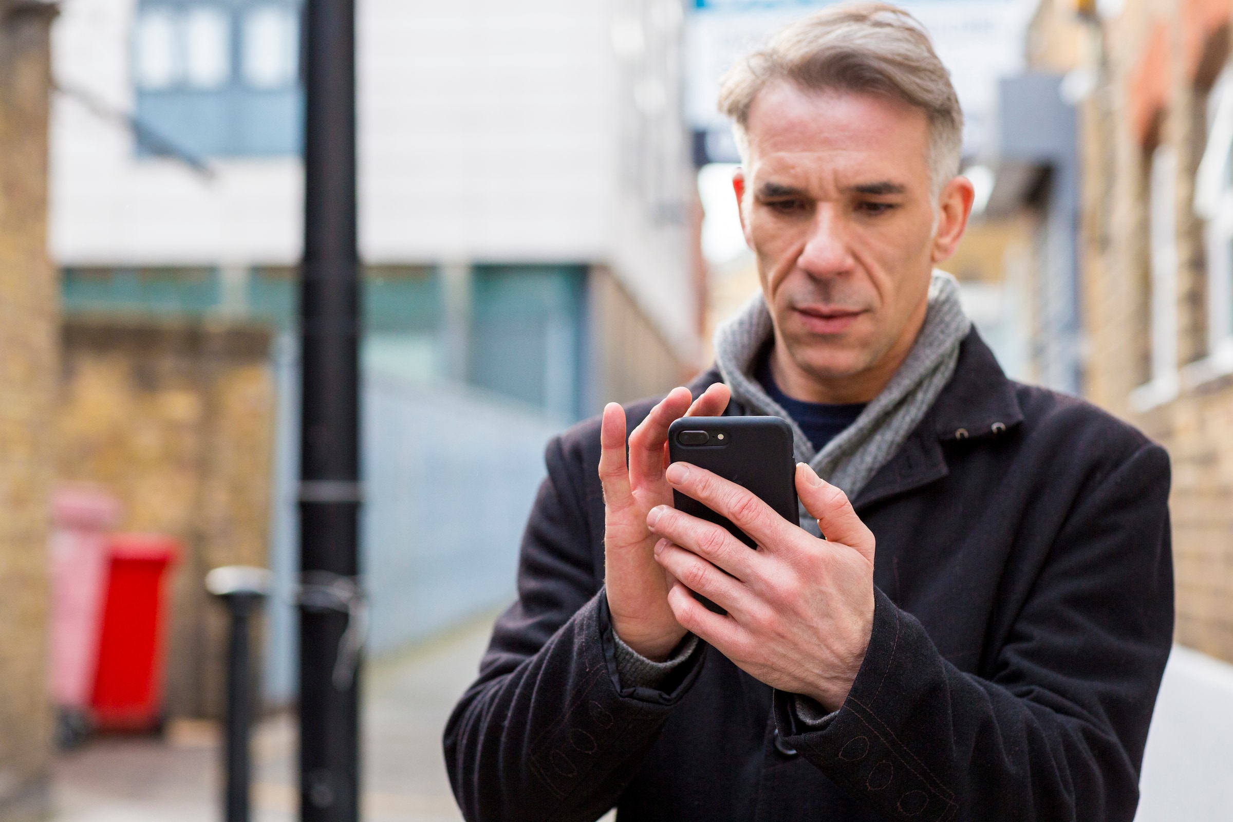 A person using a laptop to access Xero's accounting software built for car dealers