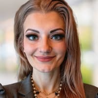 A headshot of author Lena Hanna